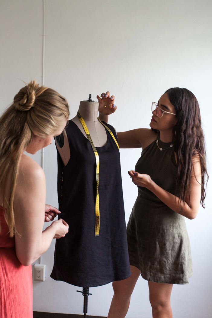 Fashion Designers Making a Dress